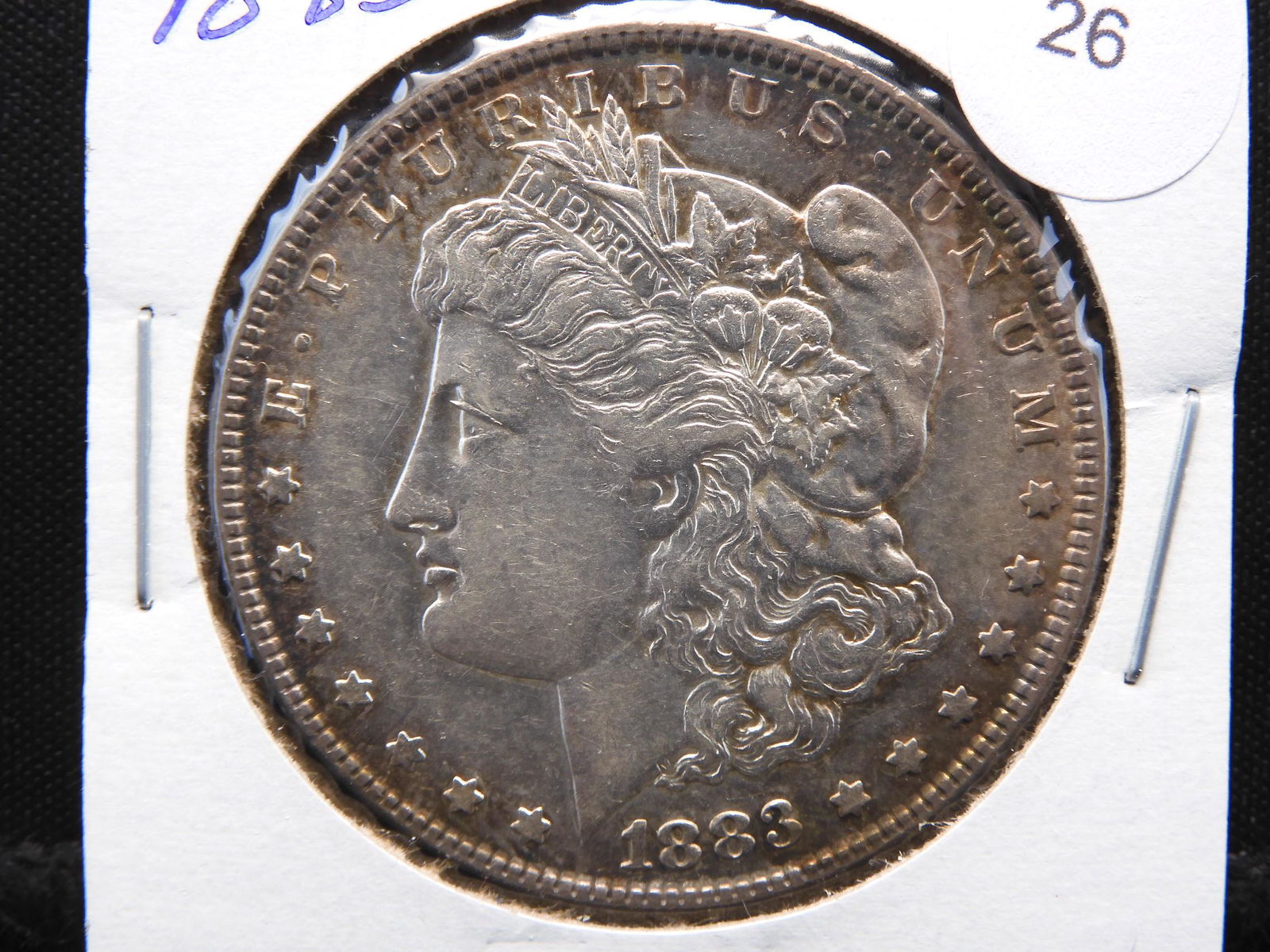 1883 Morgan Dollar. Rim Toning.: 1883 Morgan Dollar. Rim Toning.