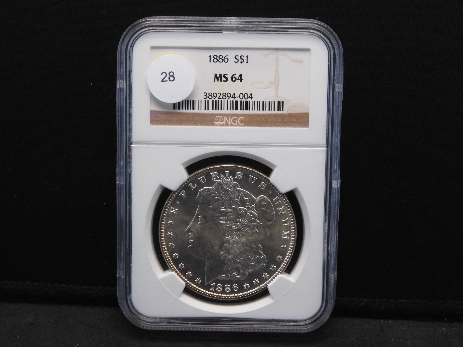 1886 Morgan Dollar.  Slabbed by NGC (Top tier Grader) (1 of 4)