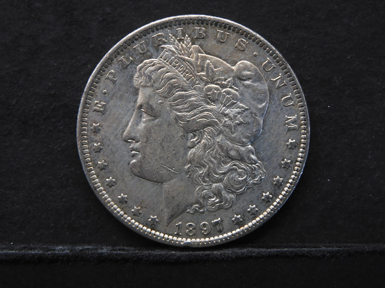1897-S (LOOKS UNC/5.8 MILL MINTED) MORGAN SILVER (90%) (1 of 2)