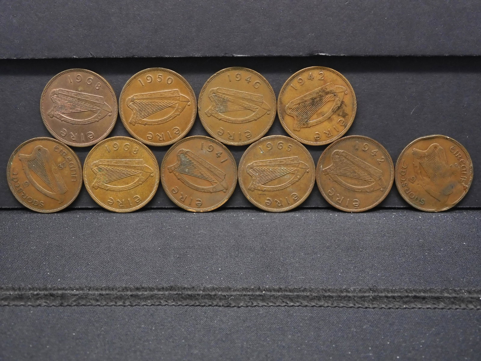 Ten Ireland 1 Penny Coins. OBV: Harp. REV: Hen With: Ten Ireland 1 Penny Coins. OBV: Harp. REV: Hen With Chicks.