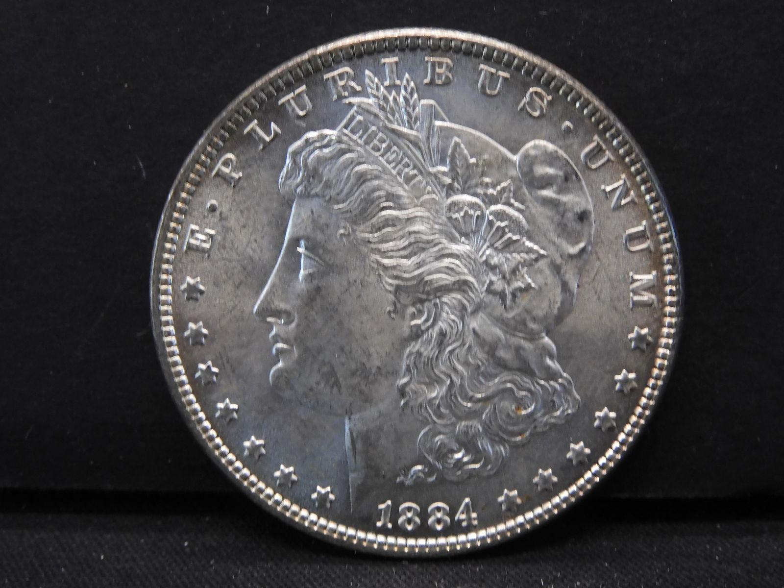 1884 Morgan Dollar Very Choice Brilliant Uncirculated. (1 of 3)