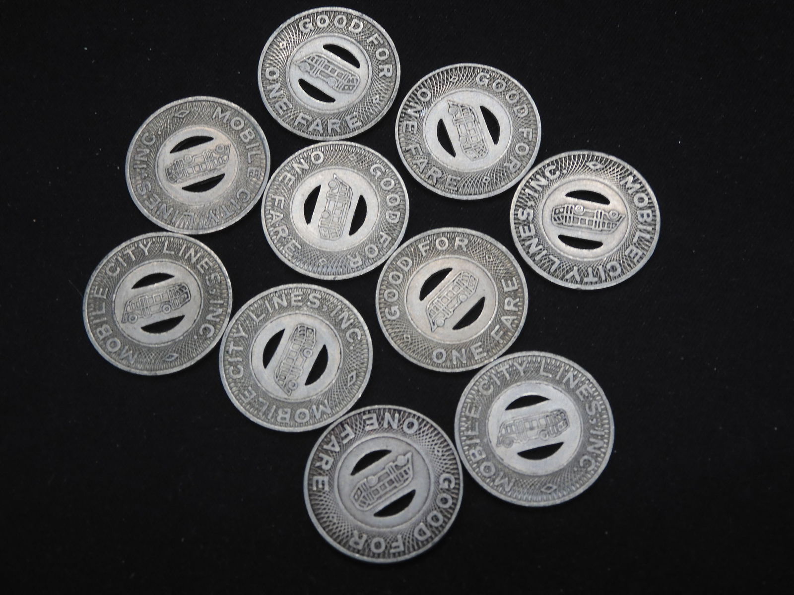 Group of 10 Transit Tokens. (1 of 3)