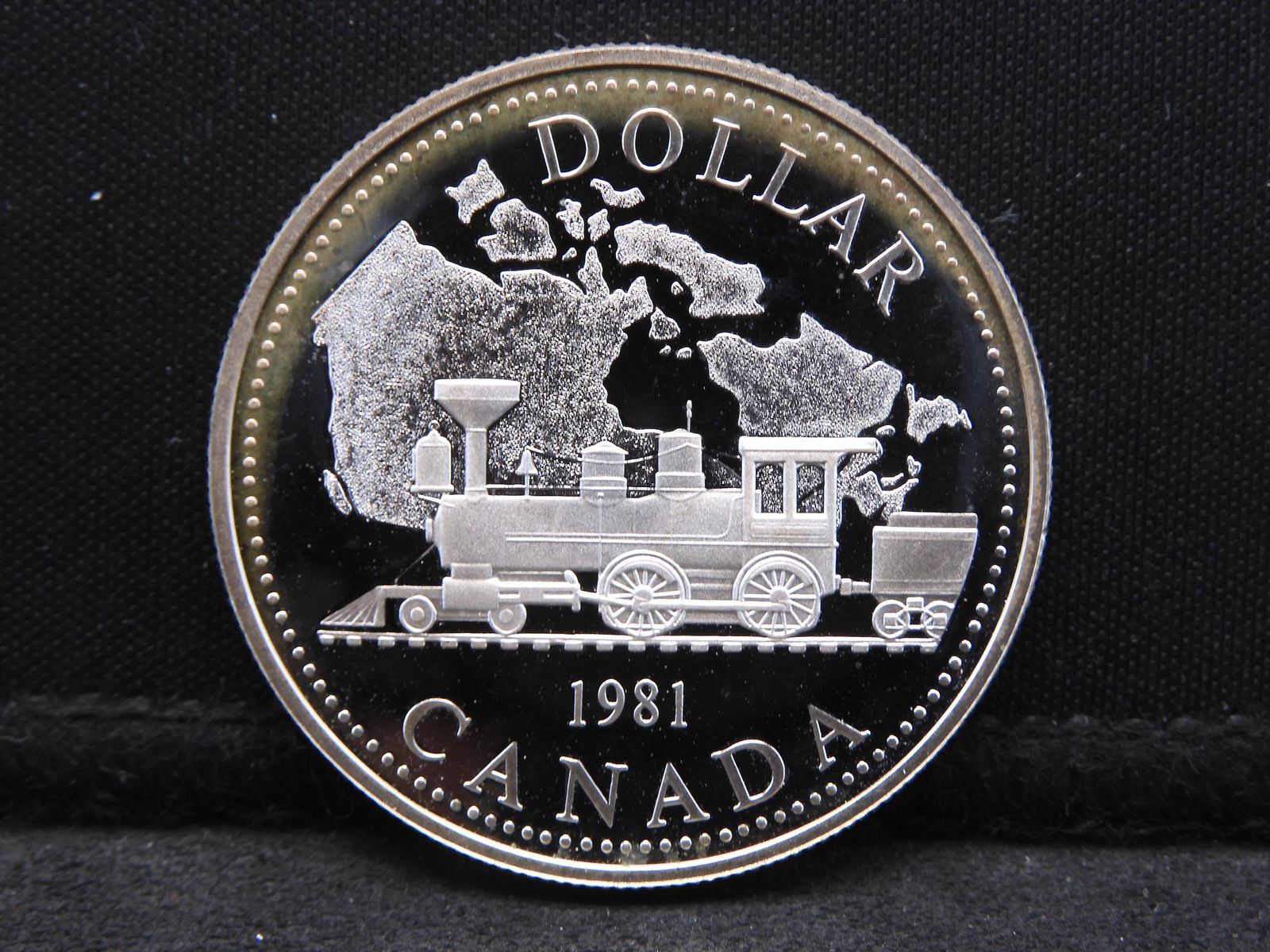 1981 Canada Proof 50% Silver Dollar Commemorating (1 of 2)