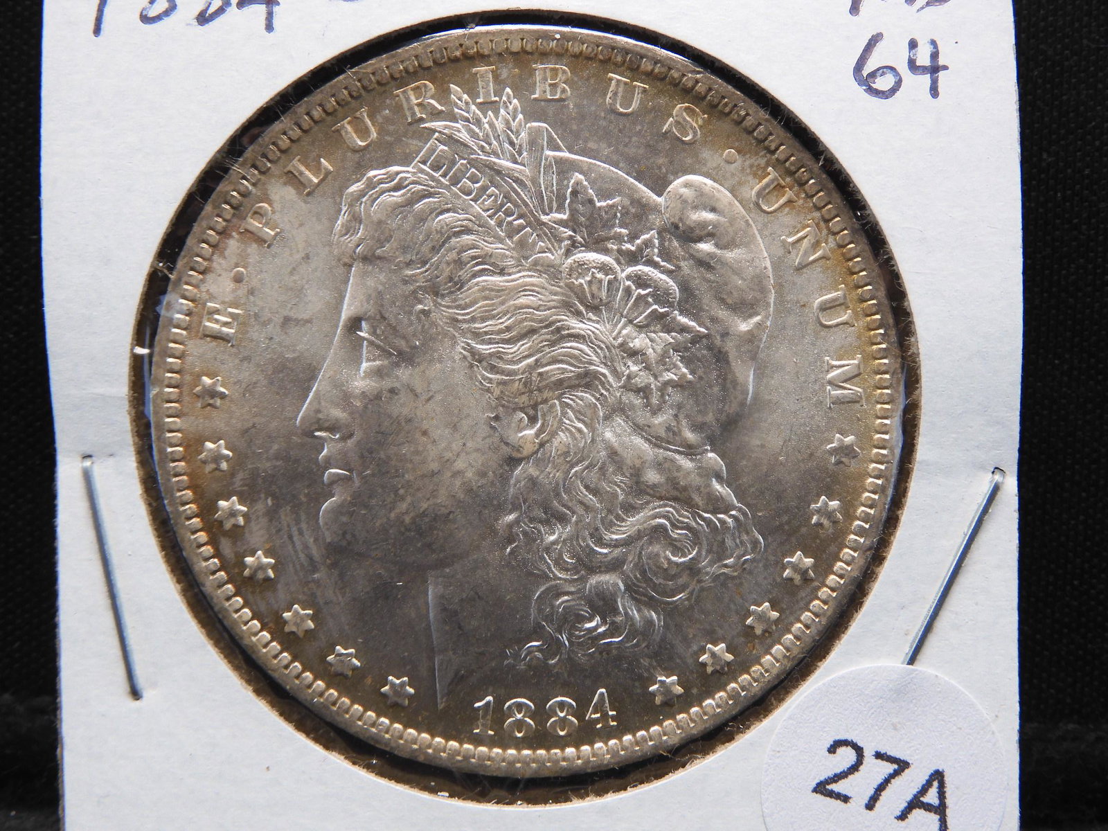 1884-O Morgan Dollar Lustrous MS 64. (1 of 3)
