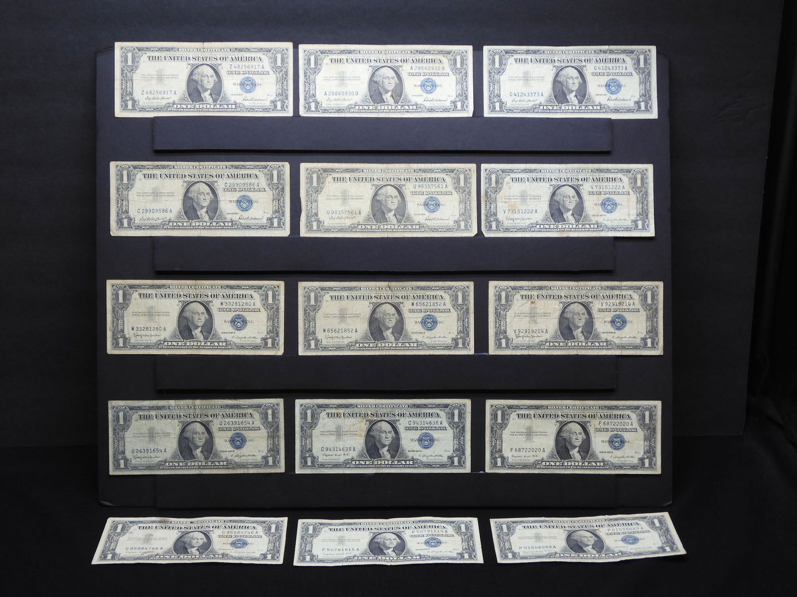 (15) 1957 $1 Silver Certificates:  (5) 57, (5) 57A, (1 of 9)