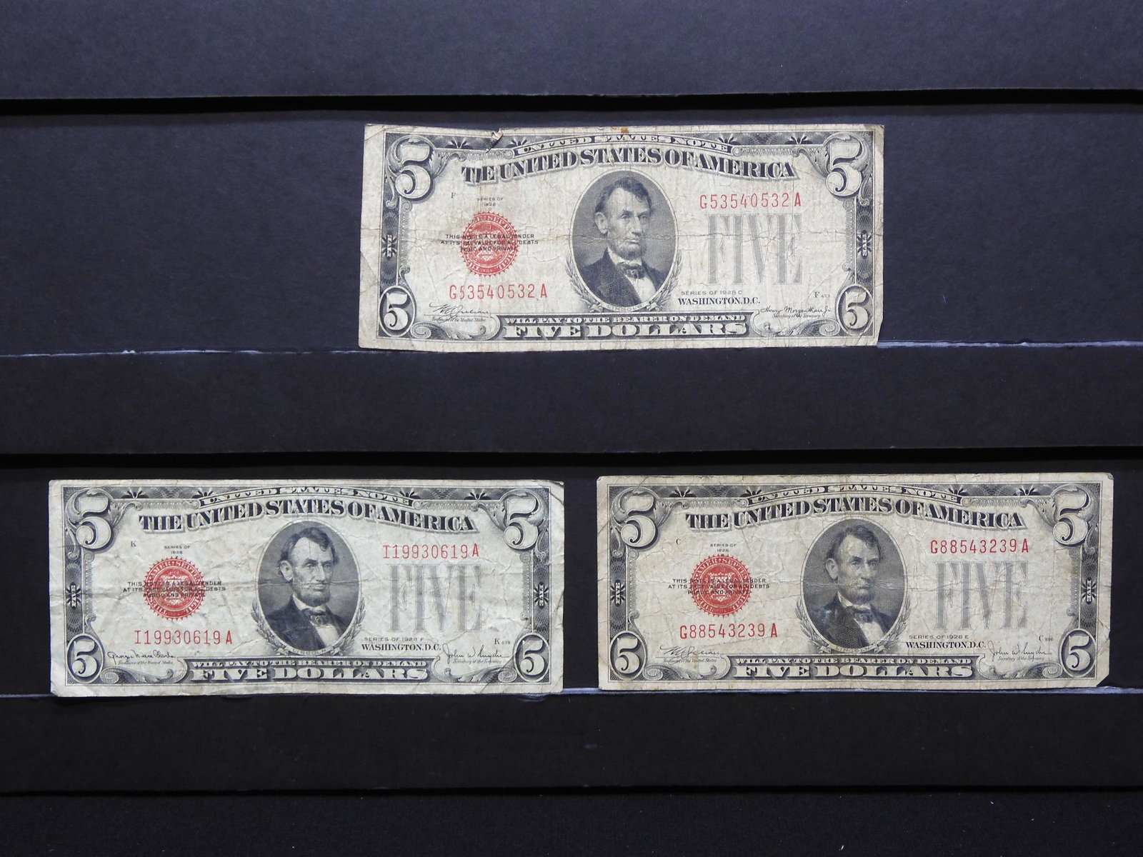 (3) Different 1928 US $5 Red Seal Notes.  1928 C, E, (1 of 6)