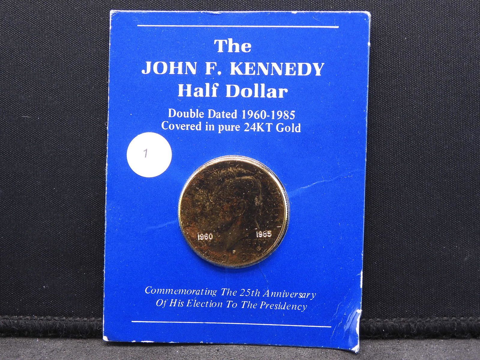 Doubled Dated 1960-1985 Kennedy Half. This 24K gold: Doubled Dated 1960-1985 Kennedy Half. This 24K gold plated coin commemorates 25 years since his election.