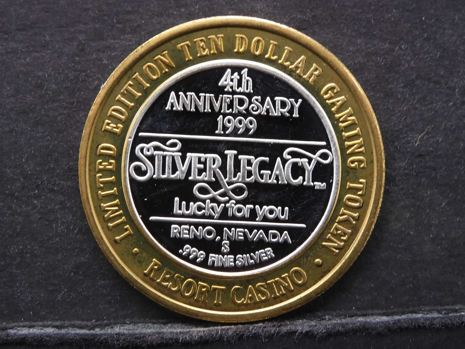 Silver Legacy 4th Ann. 1999- $10 Gaming Token .999: Silver Legacy 4th Ann. 1999- $10 Gaming Token .999 /Fine Silver Center