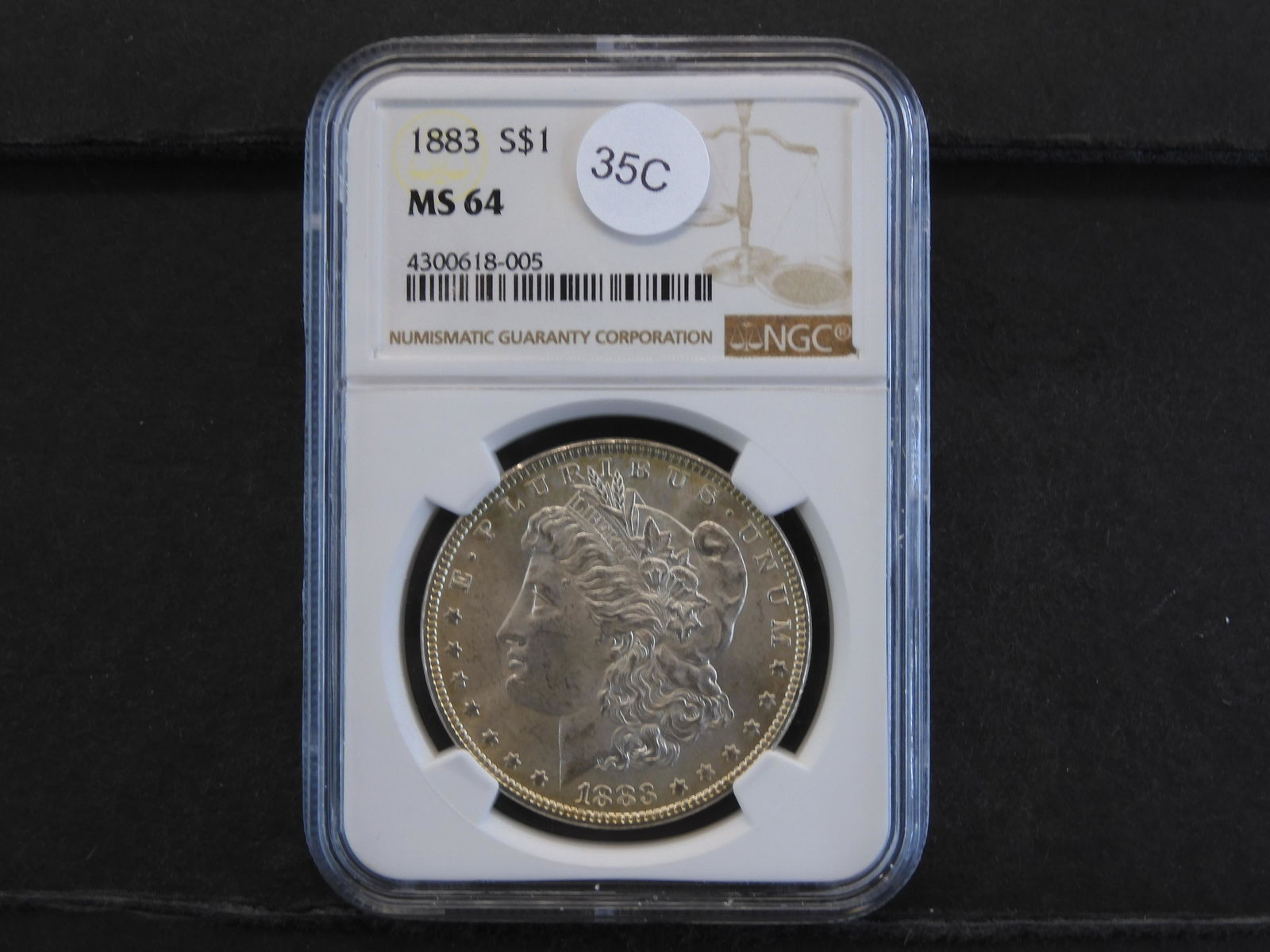 1883 Morgan Dollar MS64 NGC (1 of 4)