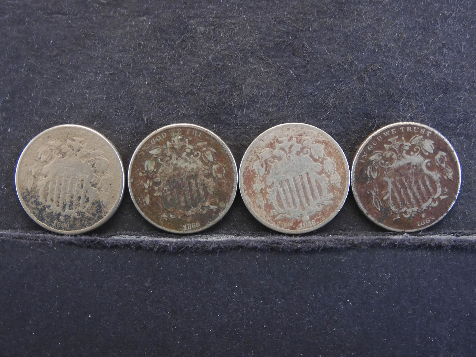 (3) 1868 Shield Nickels (1) 1869 Shield Nickel (1 of 2)