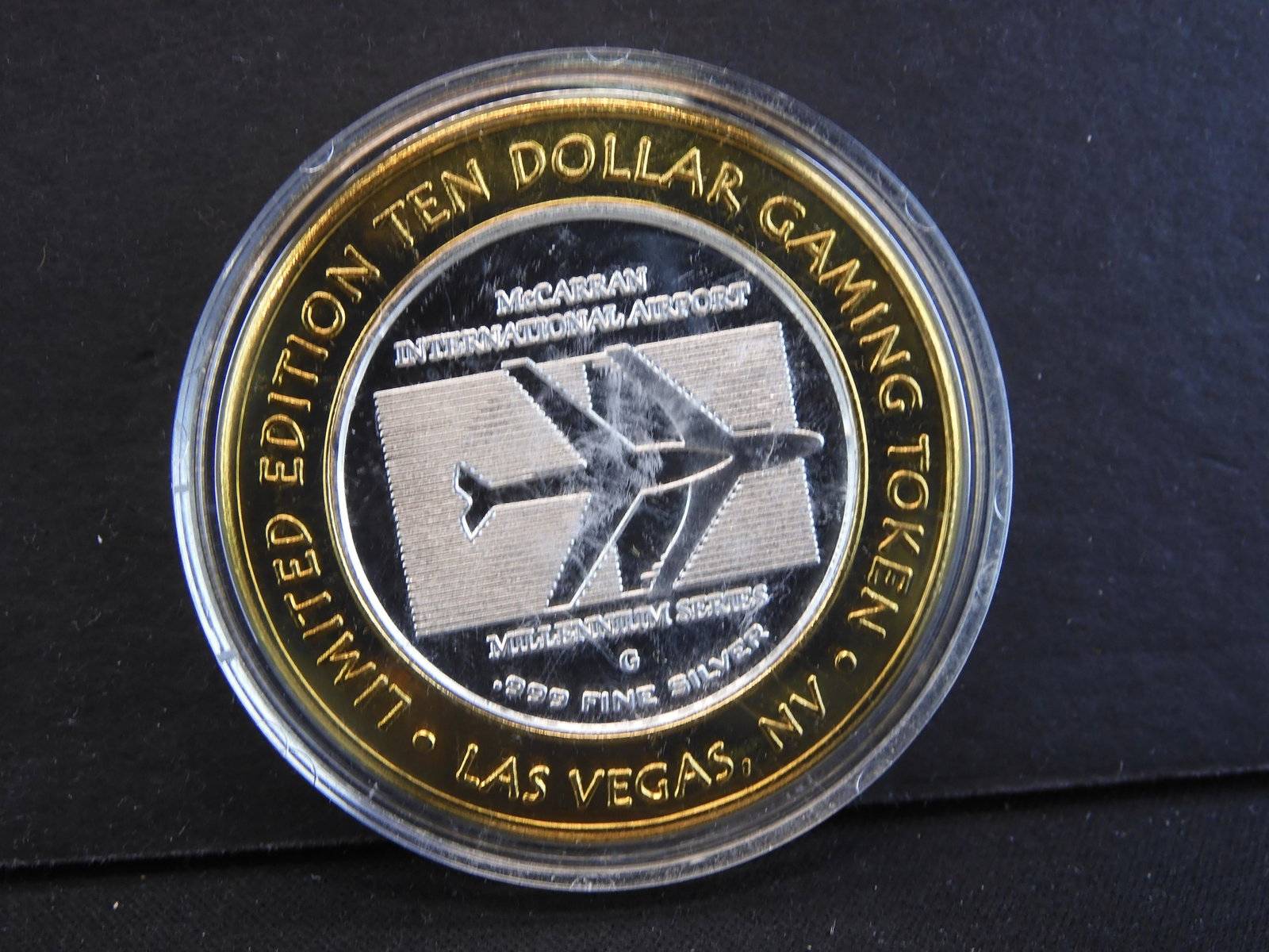 McCarran Airport Las Vegas, Nevada -.999 Fine Silver: McCarran Airport Las Vegas, Nevada -.999 Fine Silver Center- Ten Dollar Gaming Token First Plane to Land in Las Vegas Reverse