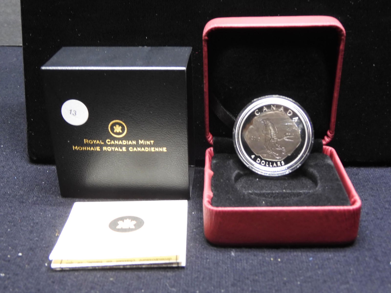 2010 Four Dollar .9999 “Dromaeosaurus” fossil in: 2010 Four Dollar .9999 “Dromaeosaurus” fossil in original box with COA. GEM Proof. Mintage 20,000.