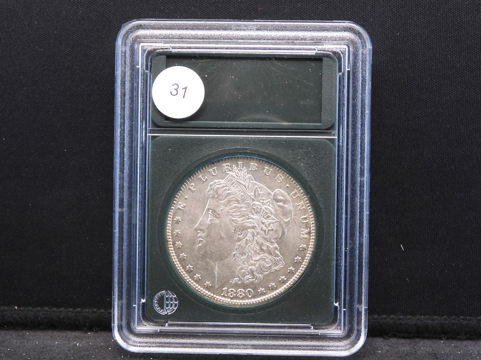 1880-O Morgan Dollar.  Uncirculated.  Very tough date. (1 of 4)