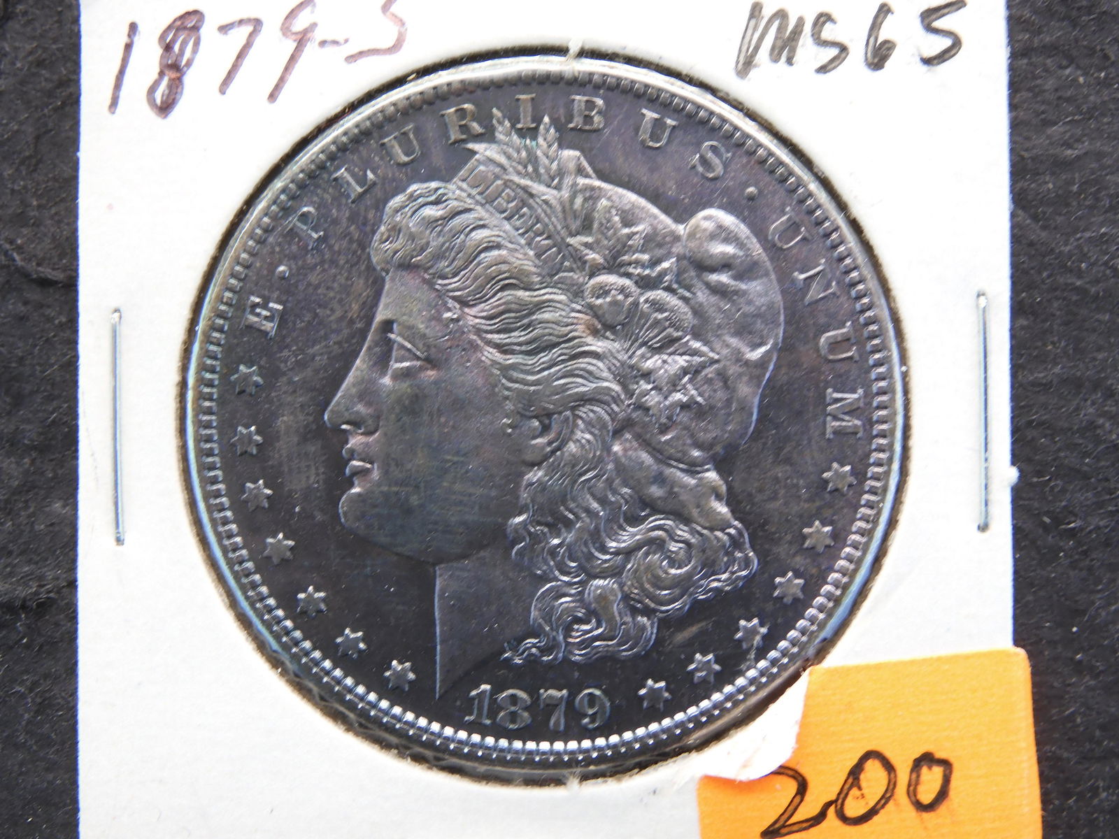 1879-S Morgan Dollar MS65. Toned. (1 of 3)