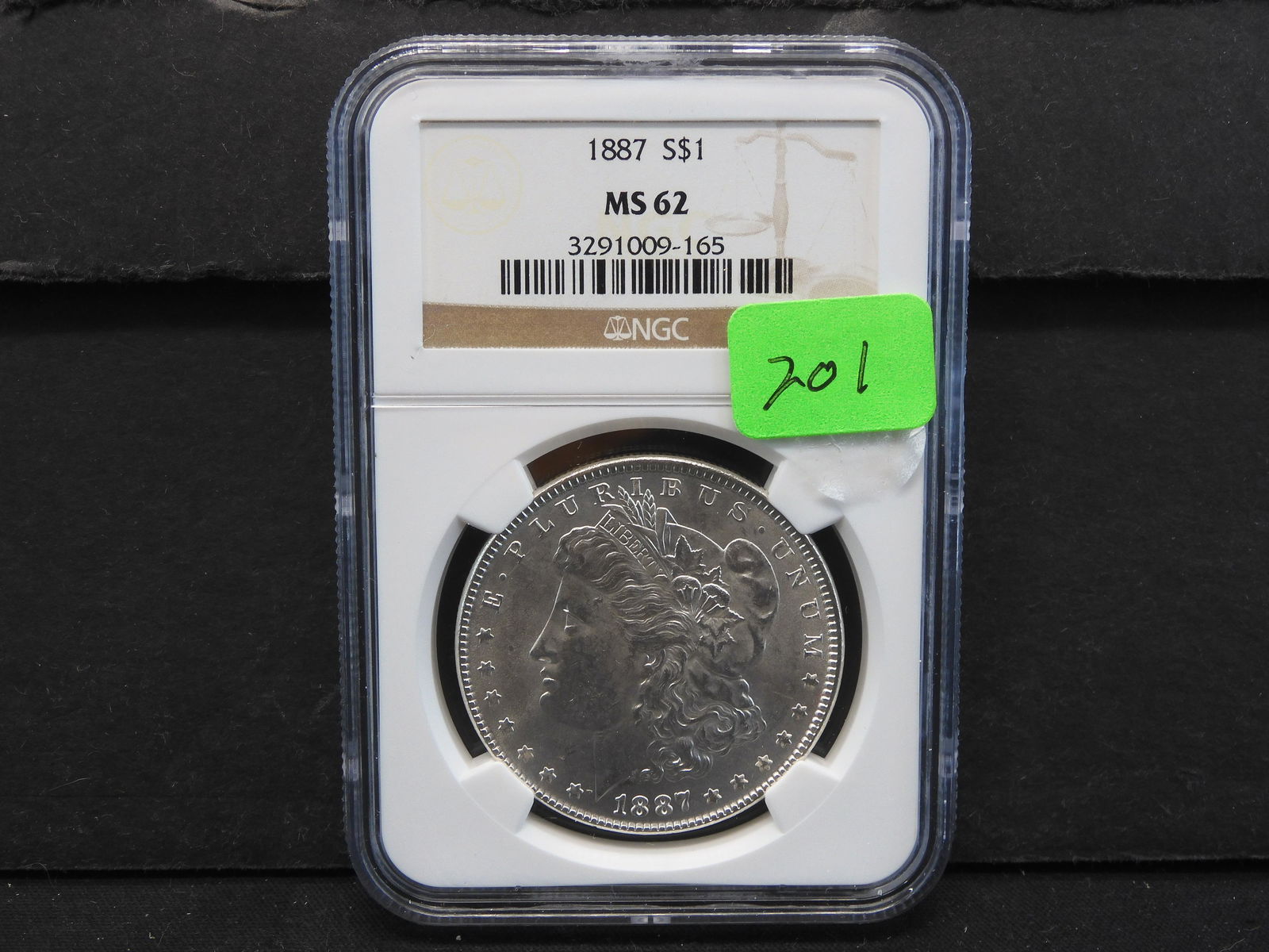 1887 Morgan Dollar MS62 NGC. (1 of 4)