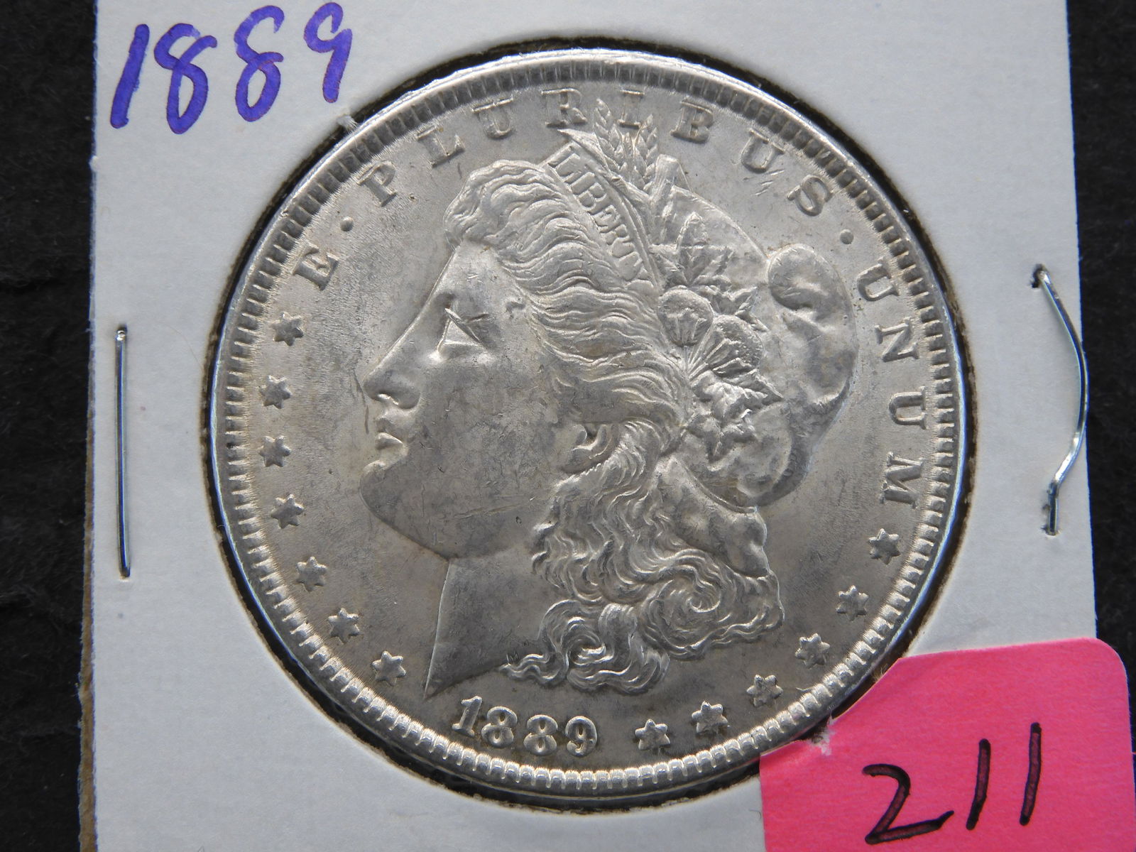 1889 Morgan Dollar MS62. (1 of 3)