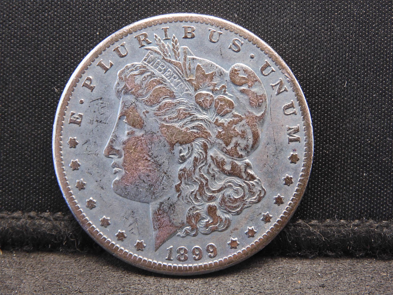 1899-O Toned  Morgan Silver Dollar - 90% Silver (1 of 2)