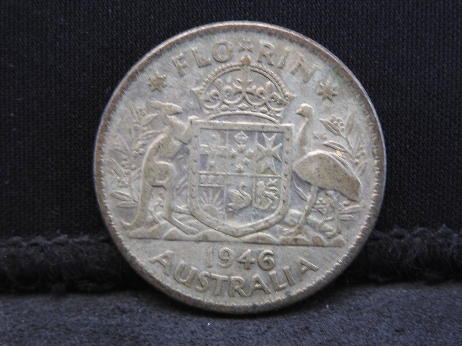 1946 Australia One Florin 50% Silver Coin. Coin Weighs: 1946 Australia One Florin 50% Silver Coin. Coin Weighs 0.36 Troy oz. George VI Portrait.