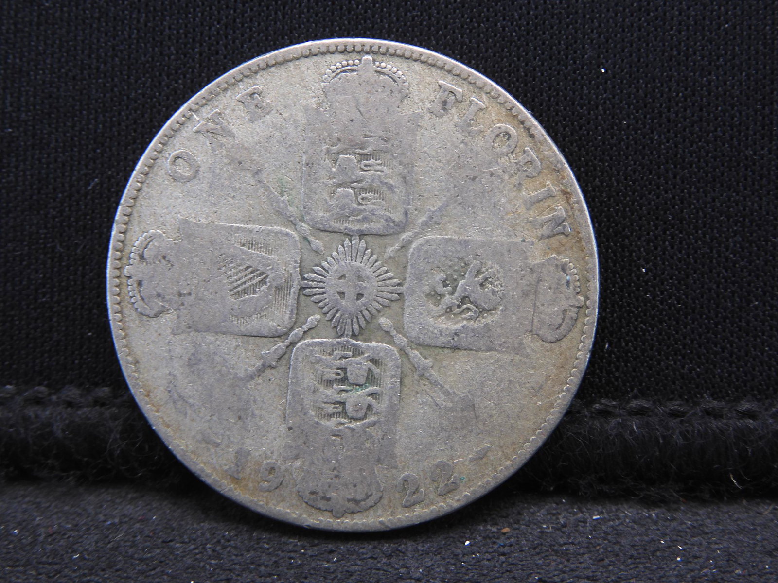 1922 Great Britain One Florin 50% Silver Coin. Coin: 1922 Great Britain One Florin 50% Silver Coin. Coin Weighs 0.35 Troy Ounce. George V Portrait.