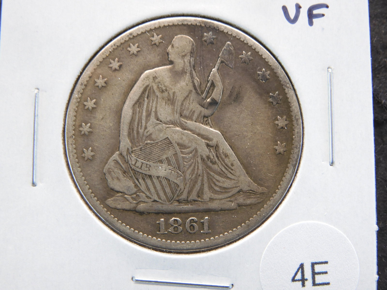1861 Seated 50c.  VF. (1 of 3)