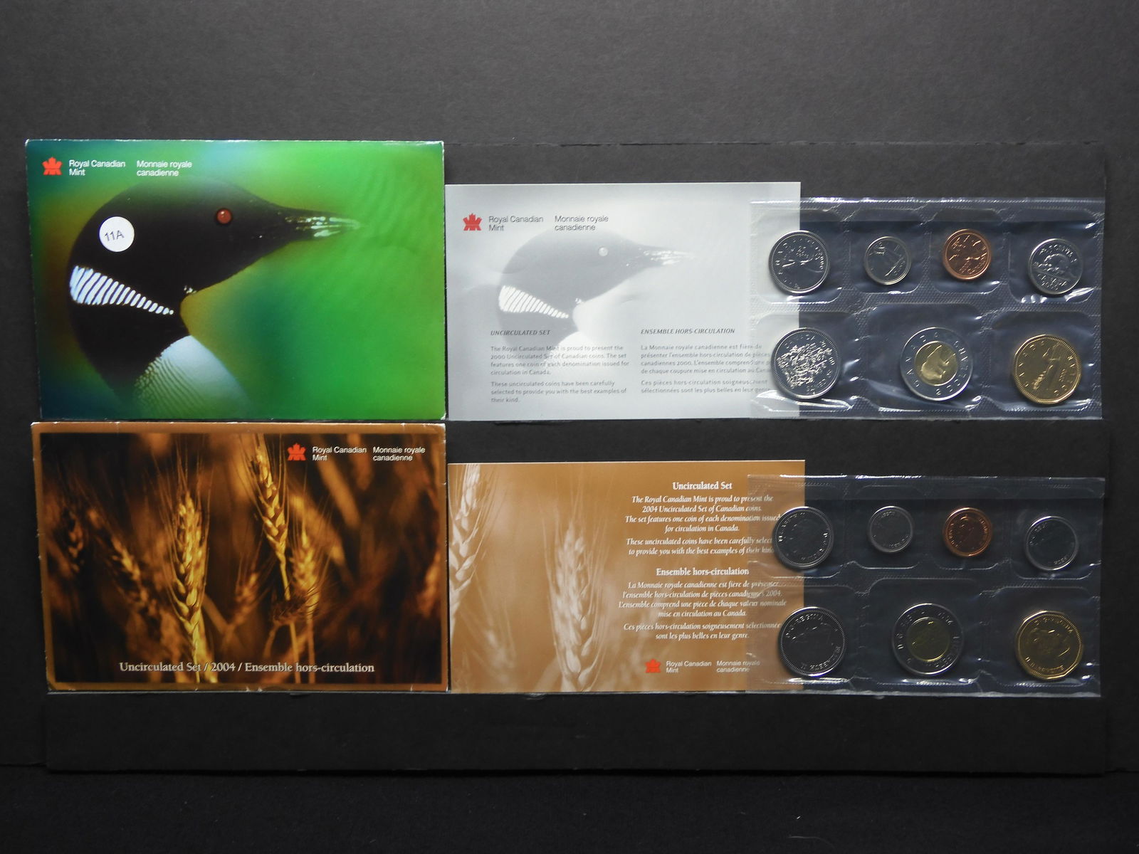 (2) Canadian Mint Sets in original envelopes:  2000 and (1 of 7)