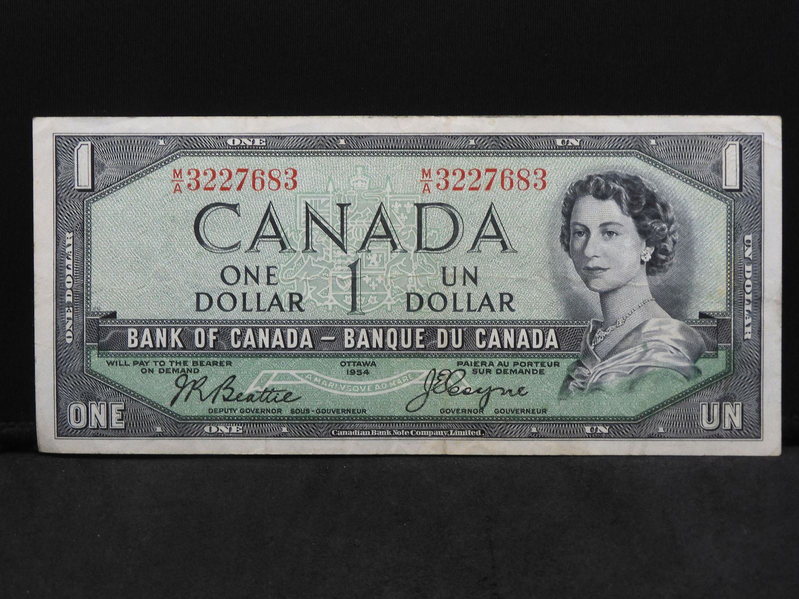 1954 Canada $1.  The famous â€œDevils Faceâ€ Variety. (1 of 3)
