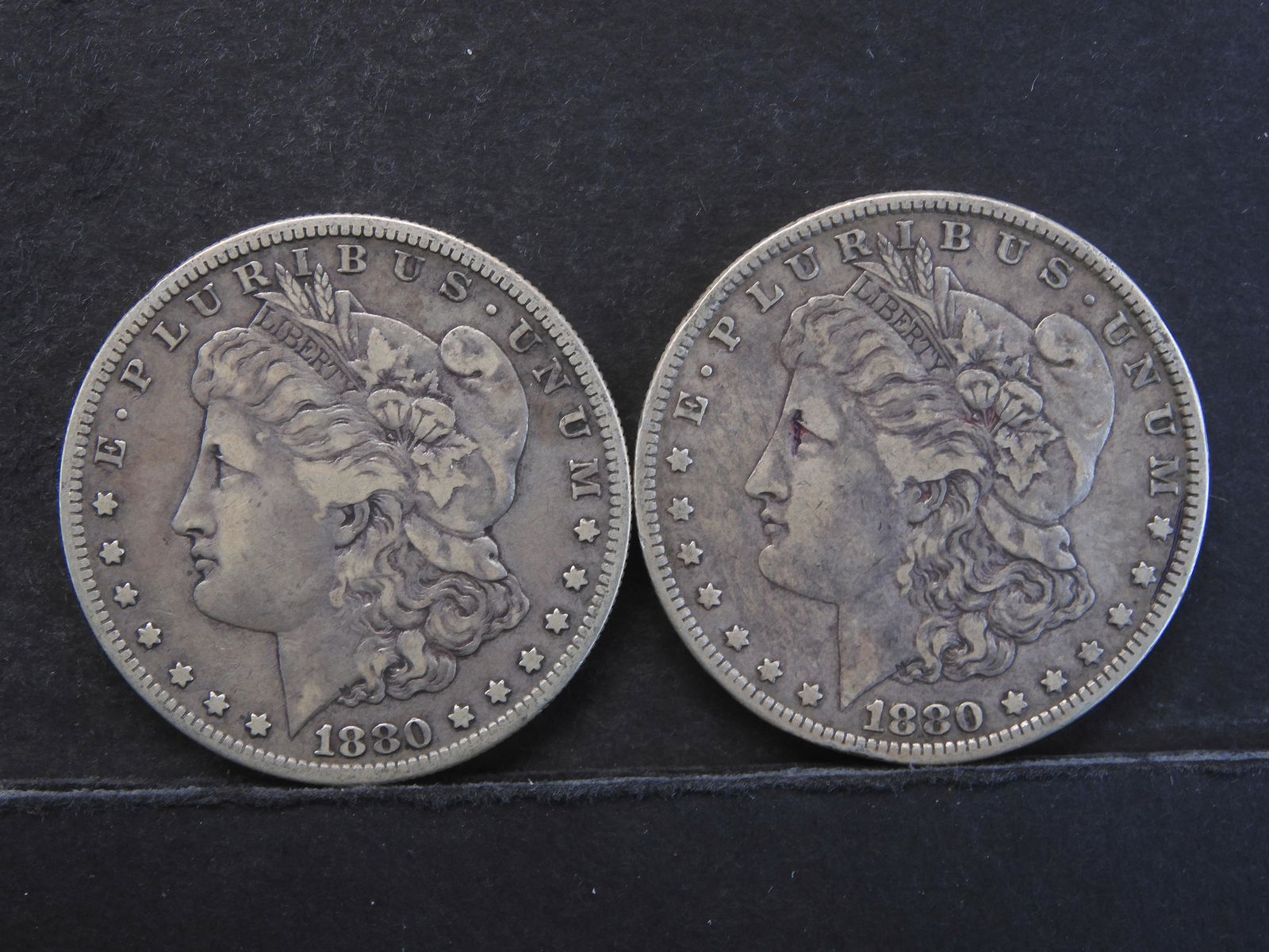 1880-O and 1880-S 2 Morgan silver dollars (1 of 2)