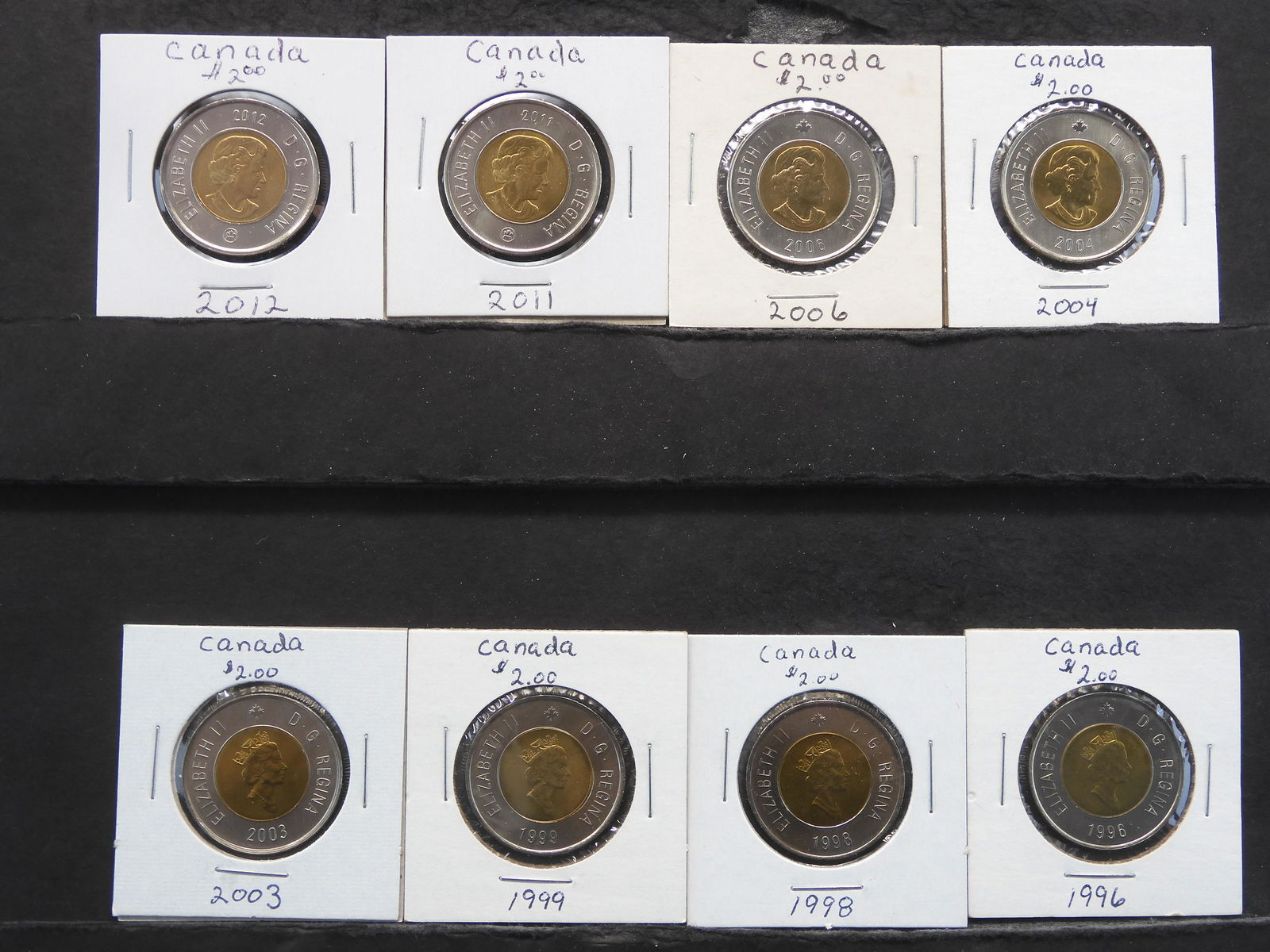 8 Different Canada $2 Bi-Metal Coins.  All UNC. (1 of 5)