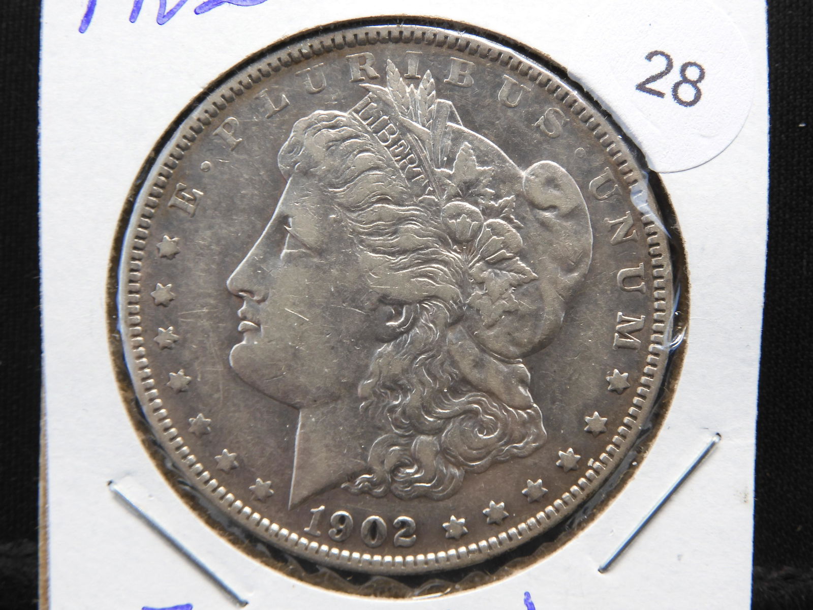 1902 Morgan Dollar.  Tough date with nice detail. (1 of 3)