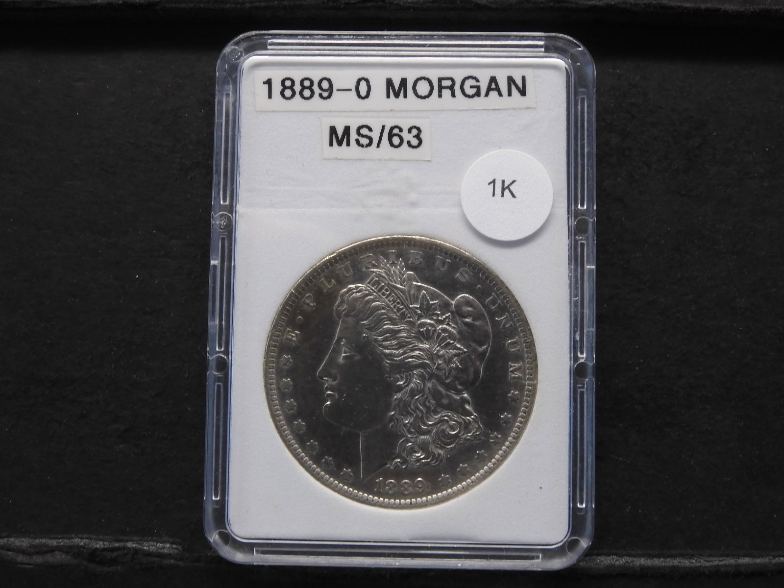 1889-O Morgan Dollar MS (1 of 4)