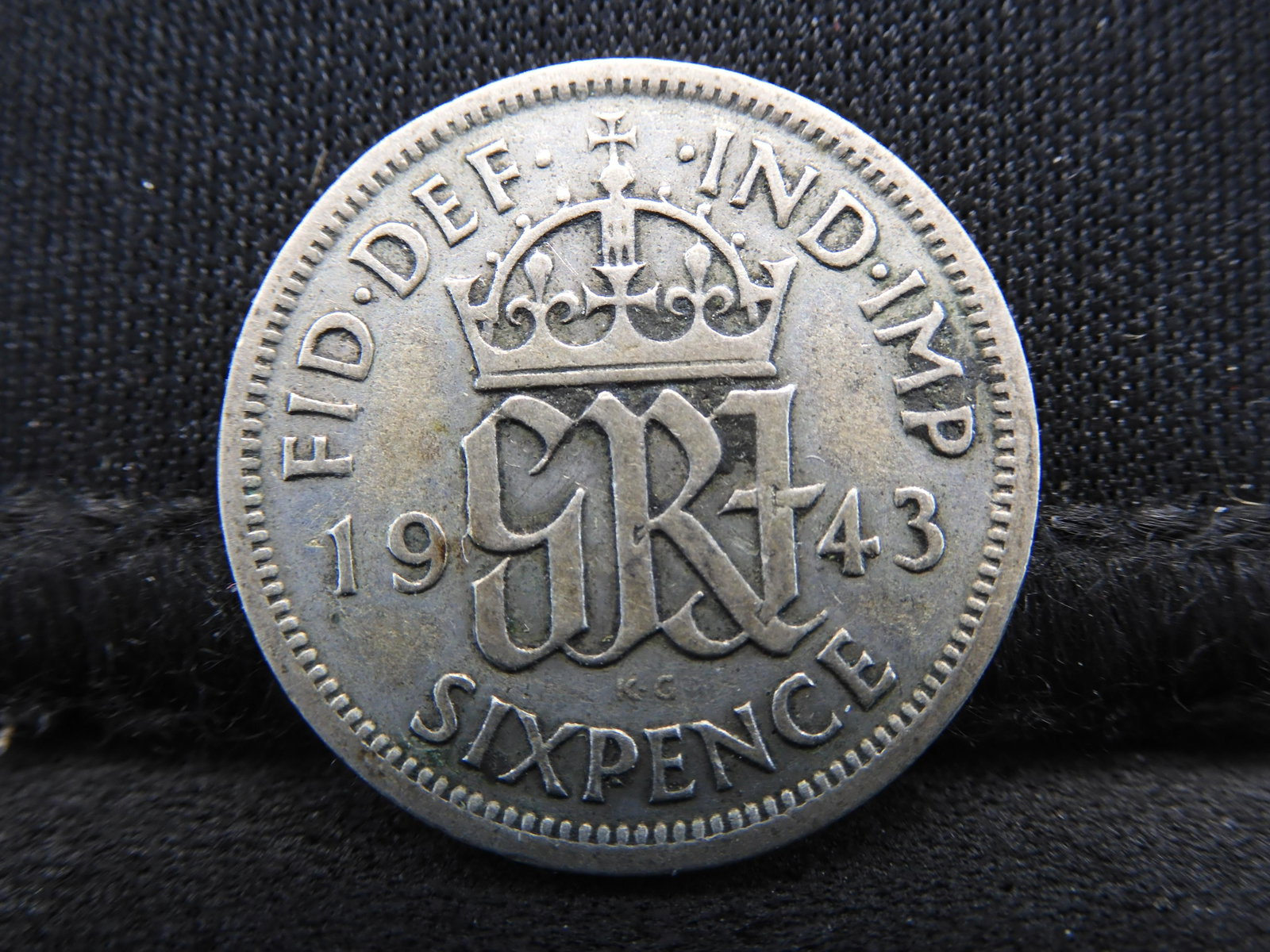 1943 Great Britain 6 Pence 50% Silver Coin. Coin: 1943 Great Britain 6 Pence 50% Silver Coin. Coin Weighs 0.09 Troy Ounce. George VI Portrait.
