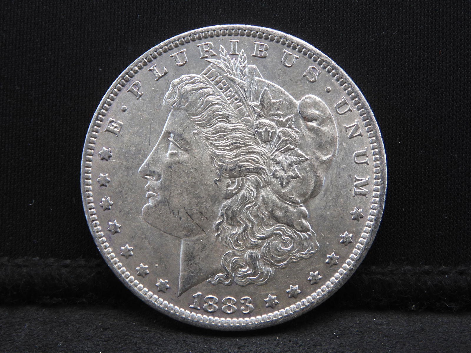 1883-O Morgan Silver Dollar - High Grade (1 of 2)