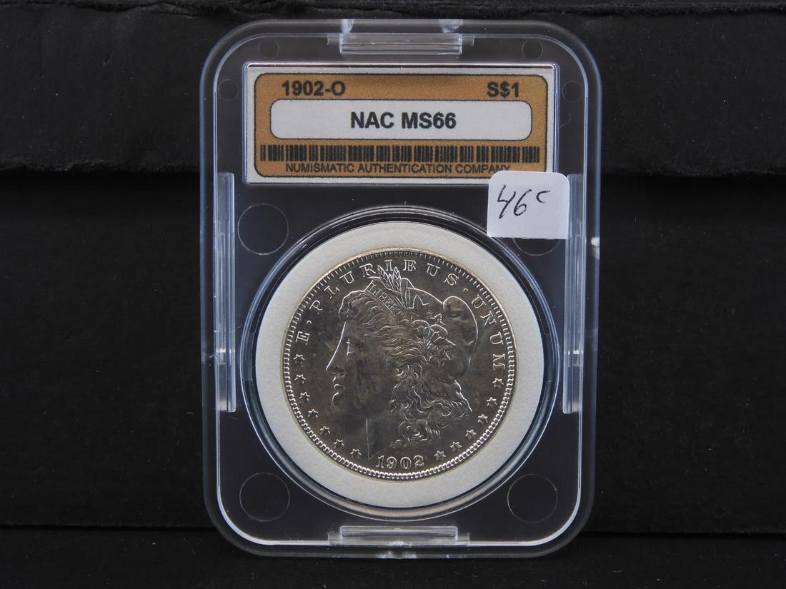 1902-0 ($650 PRICE GUIDE), SILVER/90% MORGAN DOLLAR, NAC MS66 (1 of 4)