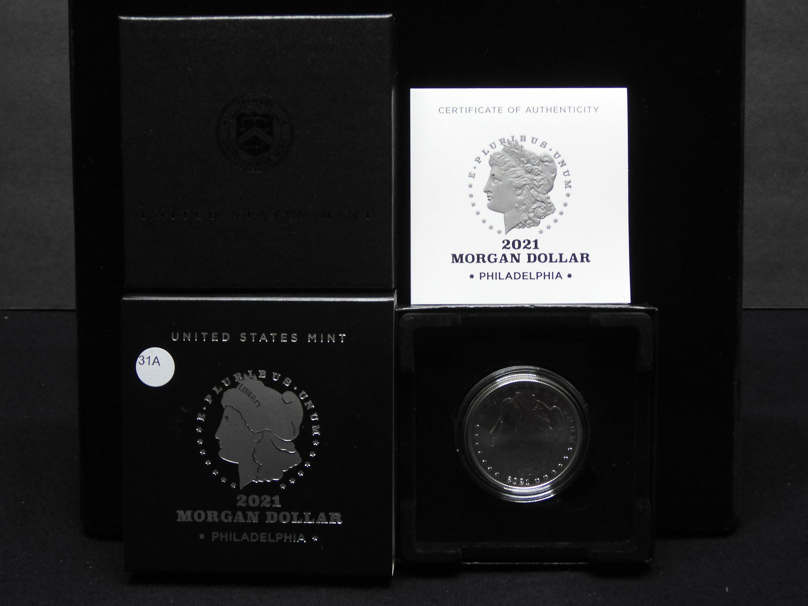 2021-P Morgan Dollar.  Very limited mintage.  In mint box with COA.  GEM. (1 of 4)