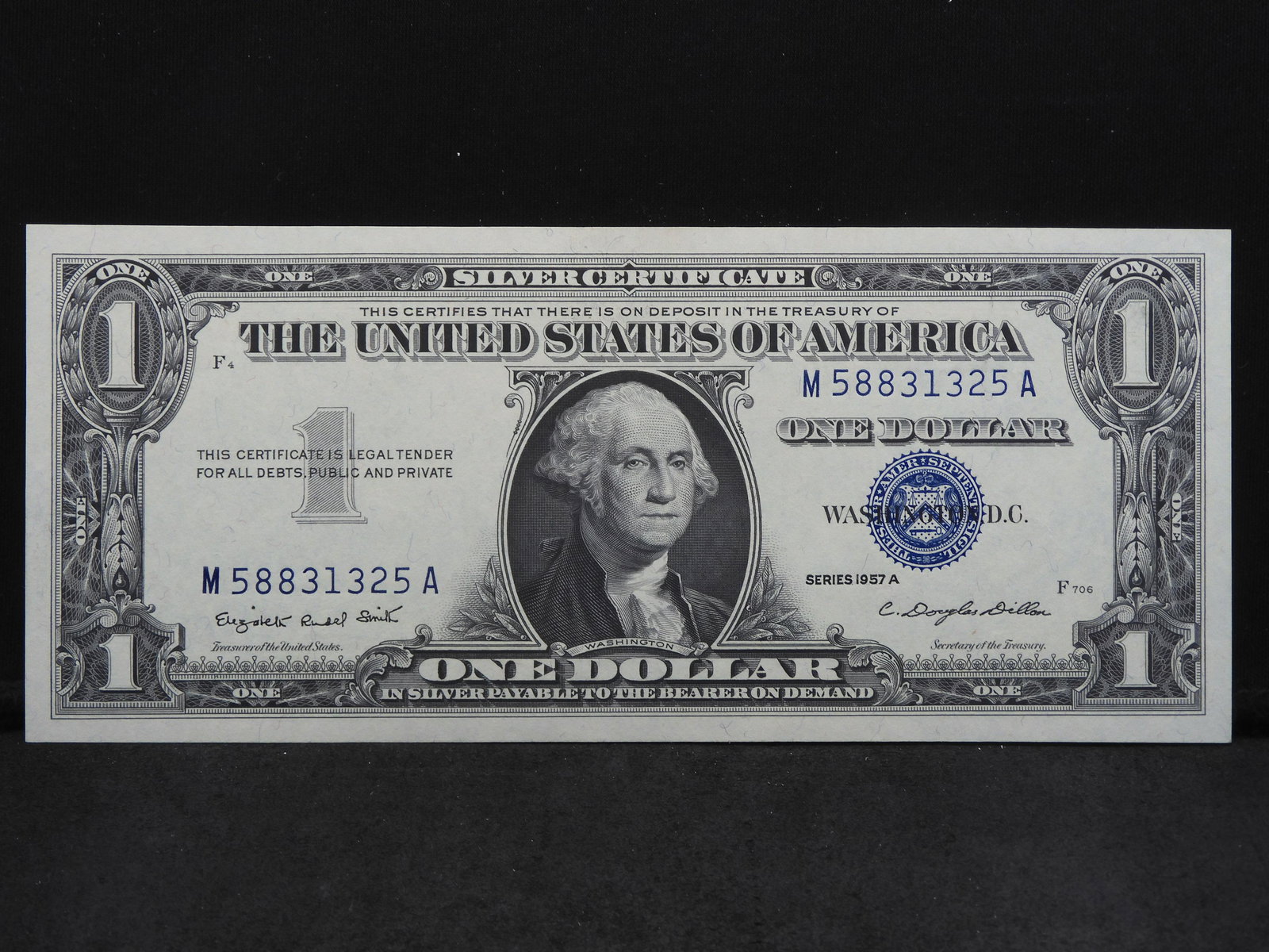 1957-A $1 Uncirculated Blue Seal Silver Certificate.  Serial # M58831325A. (1 of 3)