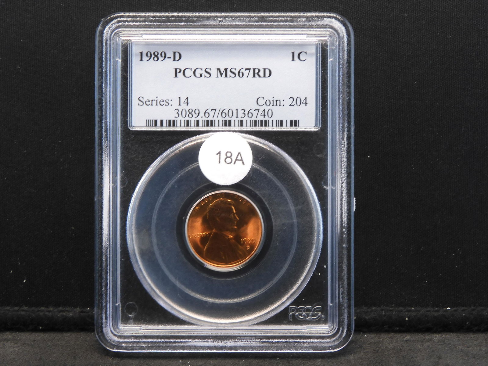 1989-D Lincoln Cent.  Slabbed by PCGS (Top Grader) as NMS67 Red.  Very high grade. (1 of 4)