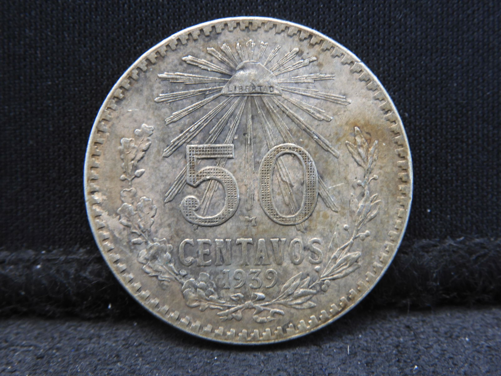 1939-Mo Mexico 50 Centavos 72% Silver Coin.  Coin Weighs 0.27 Troy Ounce.  OBV: Radiant Liberty Cap. (1 of 3)