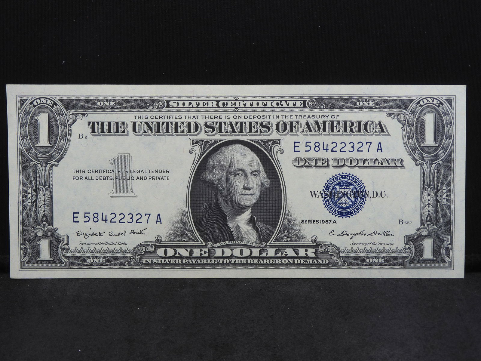 1957-A Brilliant Uncirculated $1 Blue Seal Silver Certificate.  Serial # E58422327A. (1 of 3)