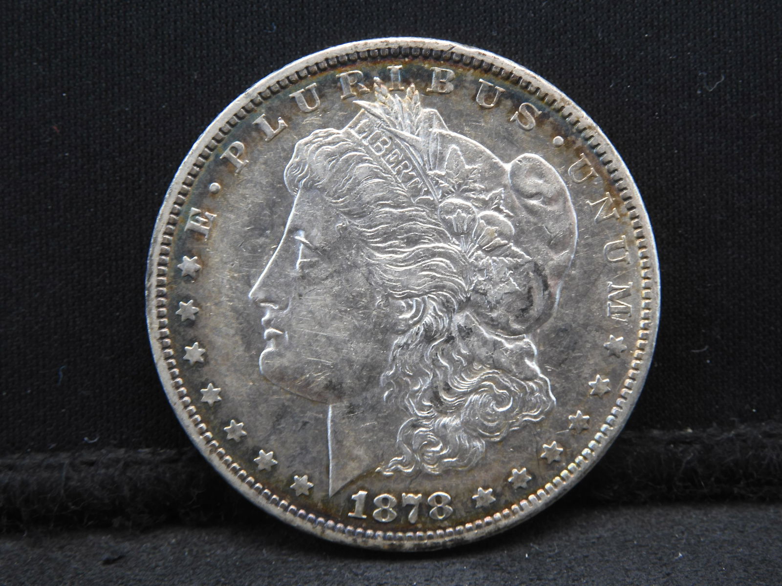 1878-CC Morgan Dollar.  AU.  Key coin with rainbow toning. (1 of 2)