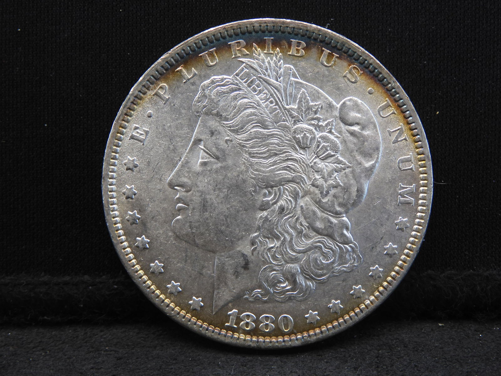 1880 Morgan Dollar.  Higher grade. (1 of 3)