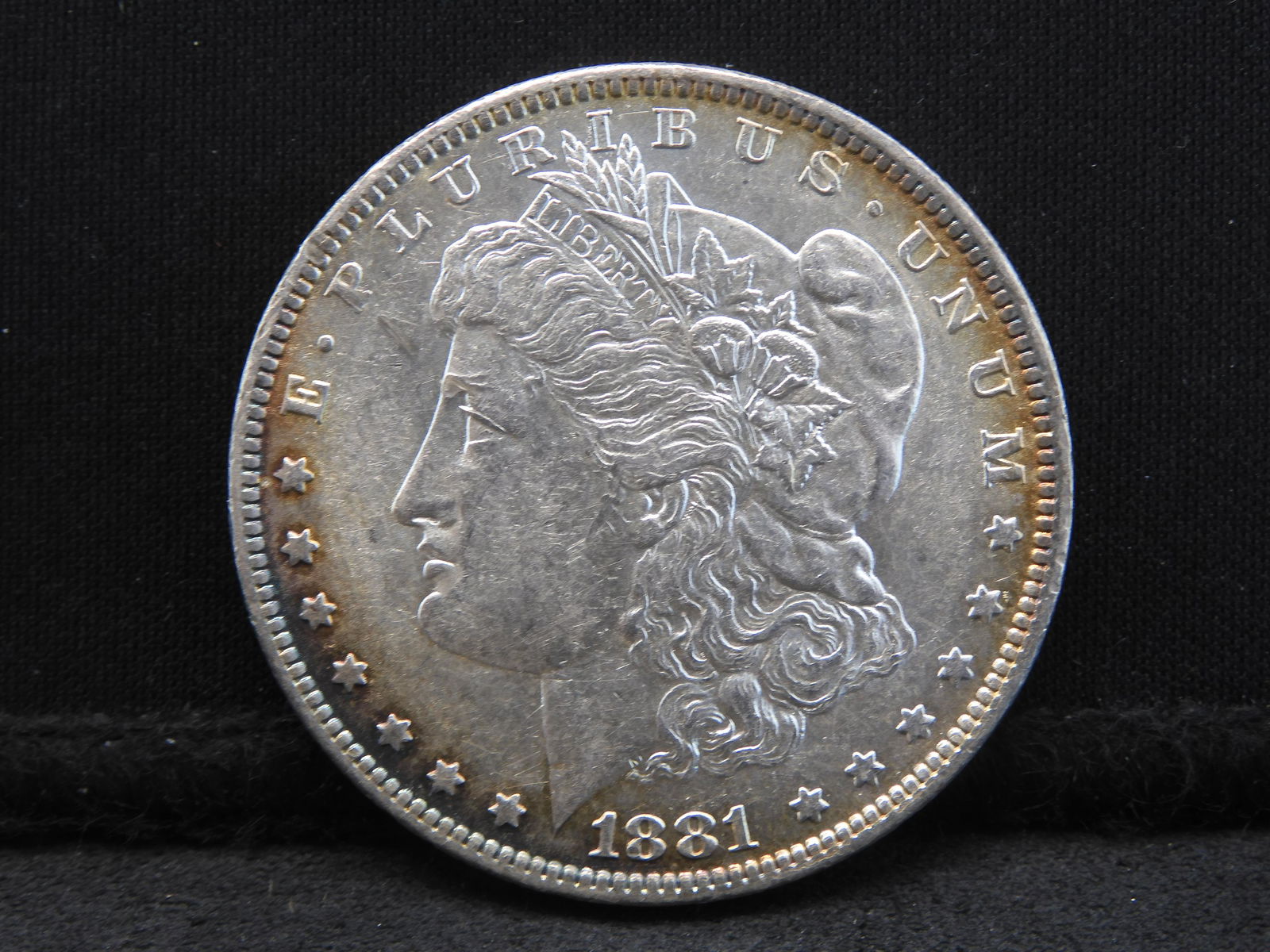 1881-O Morgan Dollar.  Higher grade. (1 of 3)