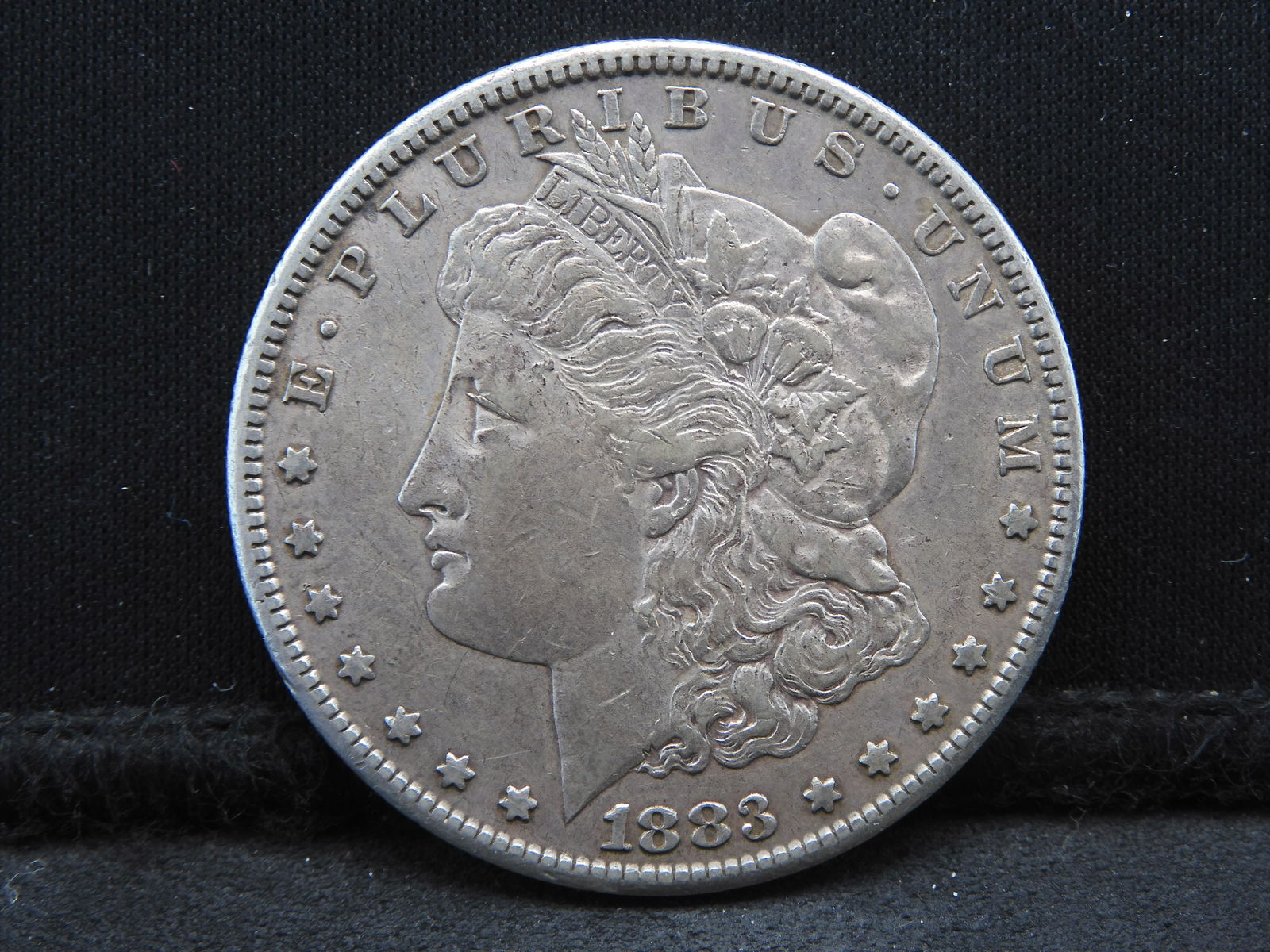 1883-S Morgan Dollar.  AU.  Really nice coin.  Quite valuable in high grade. (1 of 3)
