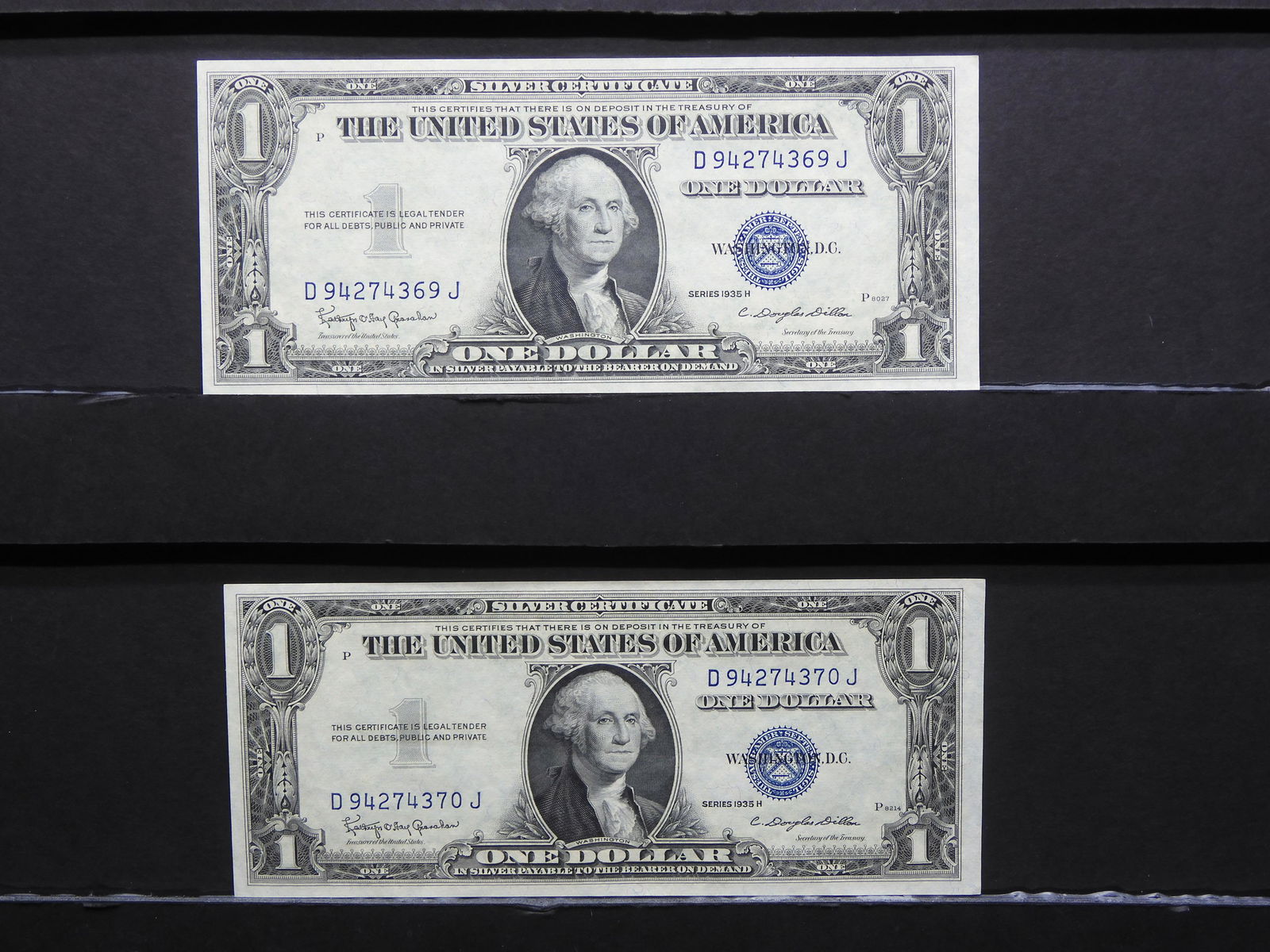 (2) Consecutive serial number 1935-H $1 silver certificates.  GEM Crisp Uncirculated. (1 of 6)