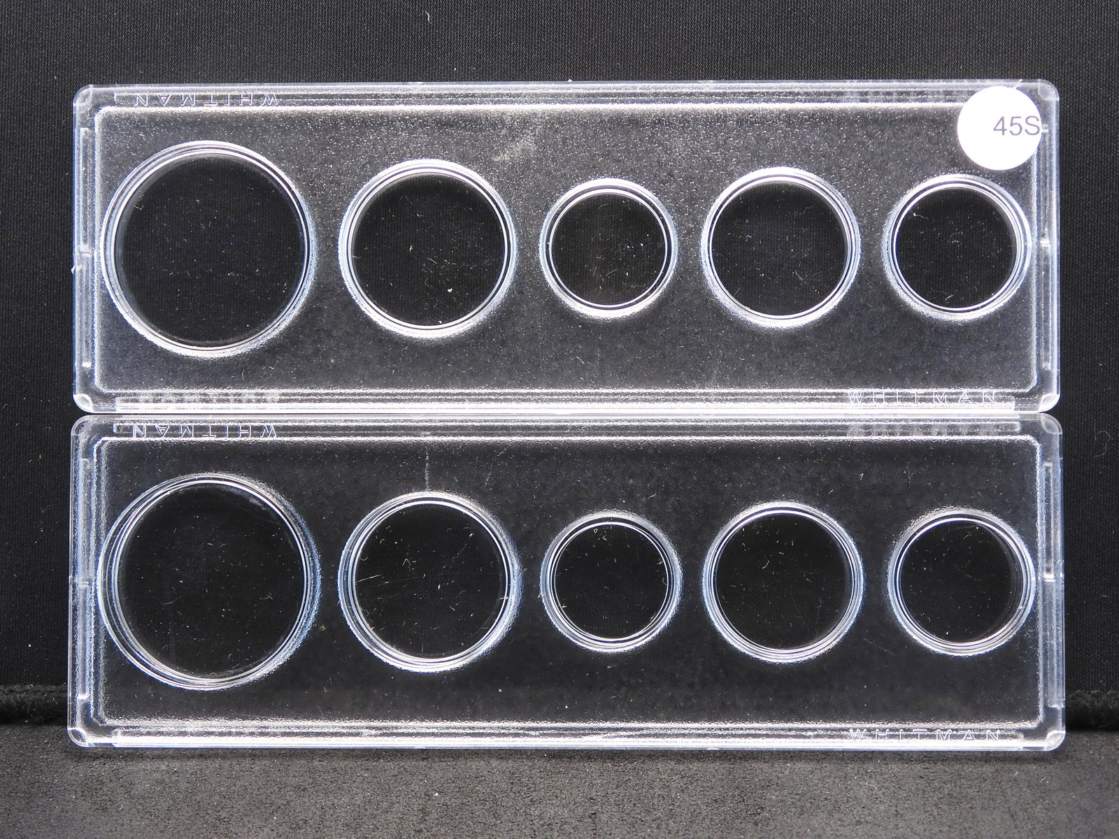 Two Empty Coin Holders (1 of 2)