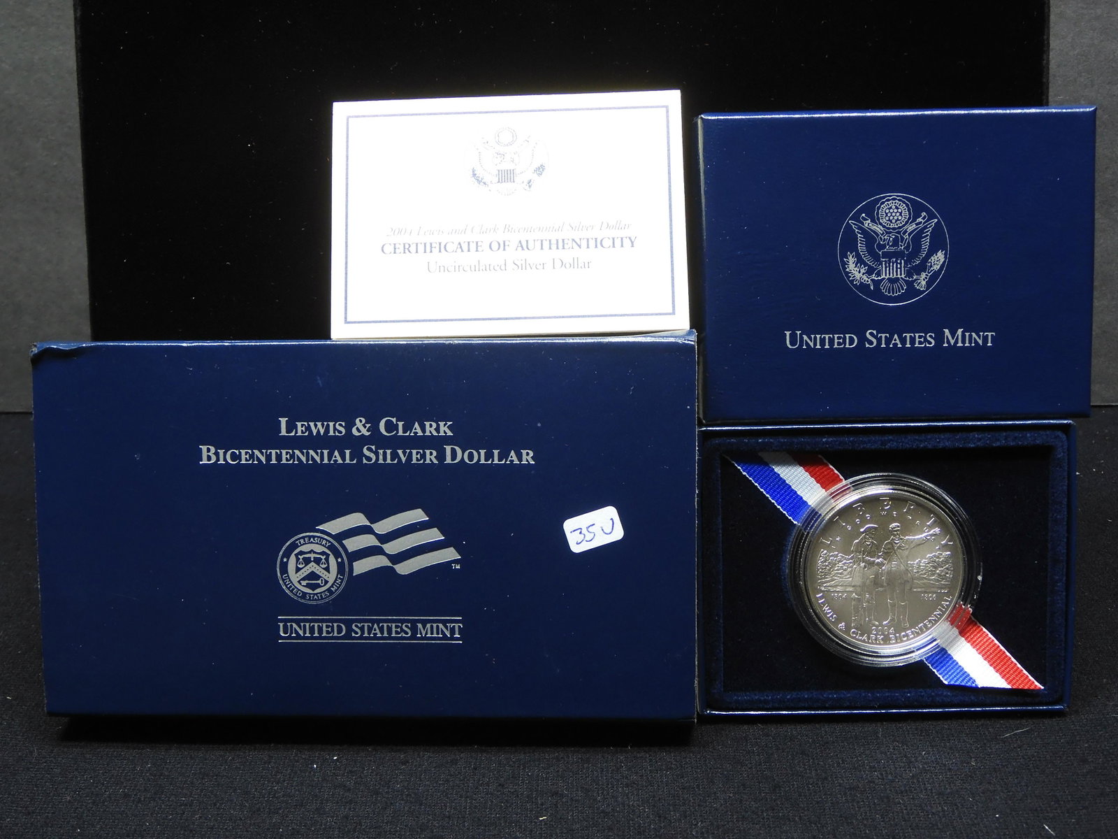 2004 Silver Lewis and Clark Gem BU Silver Dollar Commemorative Coin with original box and COA.: 2004 Silver Lewis and Clark Gem BU Silver Dollar Commemorative Coin with original box and COA.