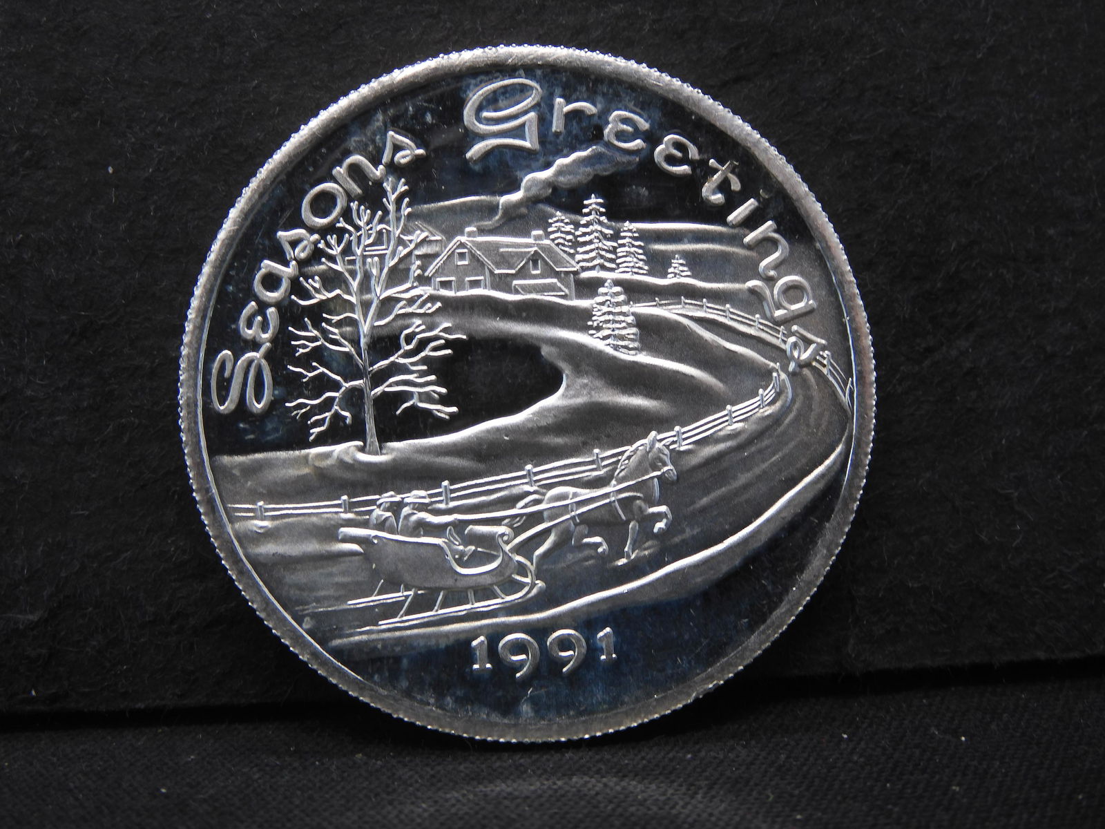 1991 Season Greetings One Troy Ounce .999 Fine Silver Christmas Round (1 of 2)