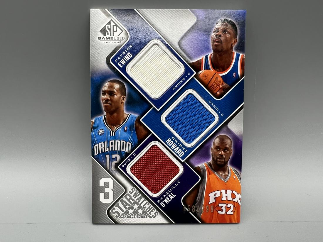 2009-10 Upper Deck SP Star Swatches Patrick Ewing/Dwight Howard/Shaquille O'Neal Triple Game Used (1 of 2)
