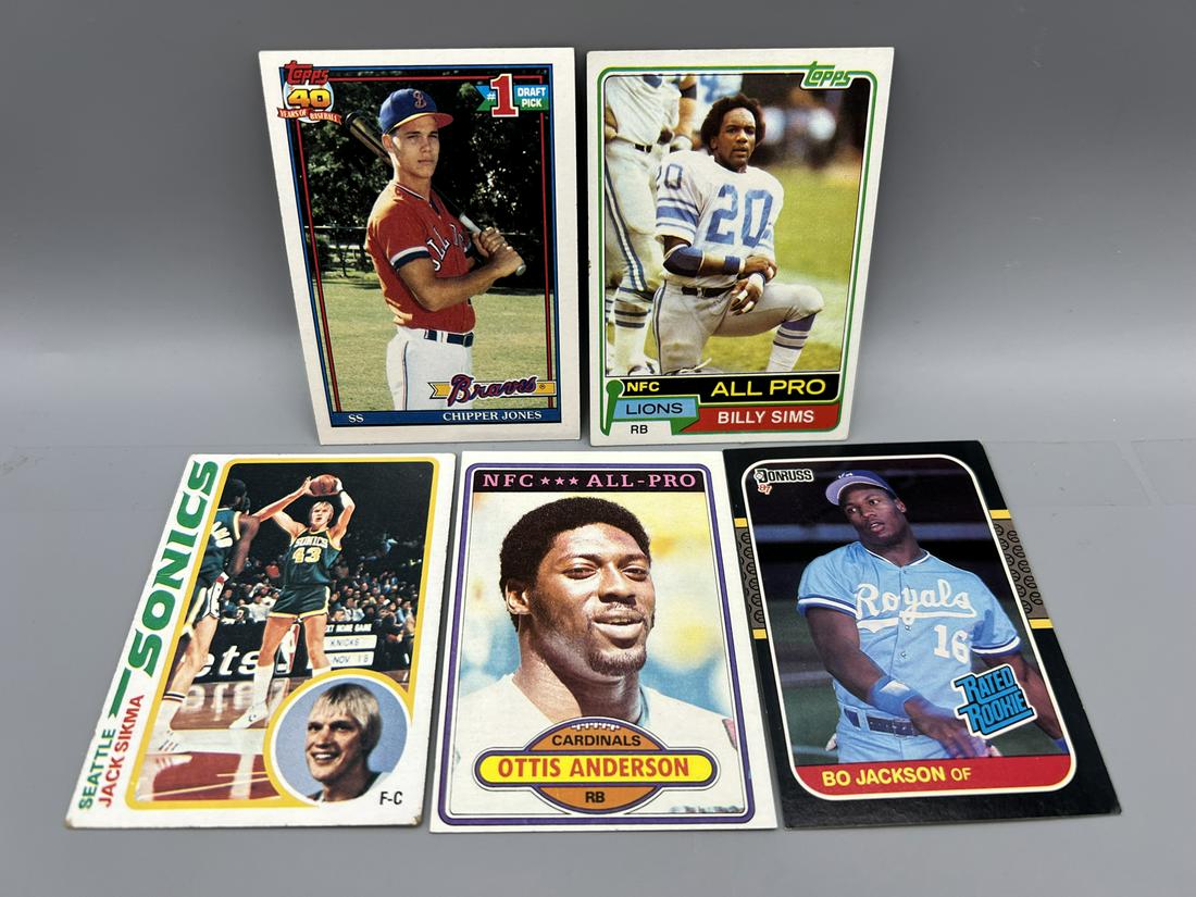Lot of (5) Assorted Multi Sport Rookie Cards - Varying Conditions - Chipper Jones, Bo Jackson, Jack: Lot of (5) Assorted Multi Sport Rookie Cards - Varying Conditions - Chipper Jones, Bo Jackson, Jack Sikma