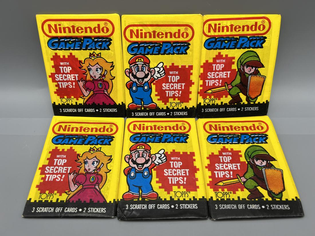 Lot of (6) Assorted 1989 Topps Nintendo Gamepack Unopened Wax Packs - 2 Peach, 2 Mario, & 2 Link -: Lot of (6) Assorted 1989 Topps Nintendo Gamepack Unopened Wax Packs - 2 Peach, 2 Mario, & 2 Link - Wrapper Art