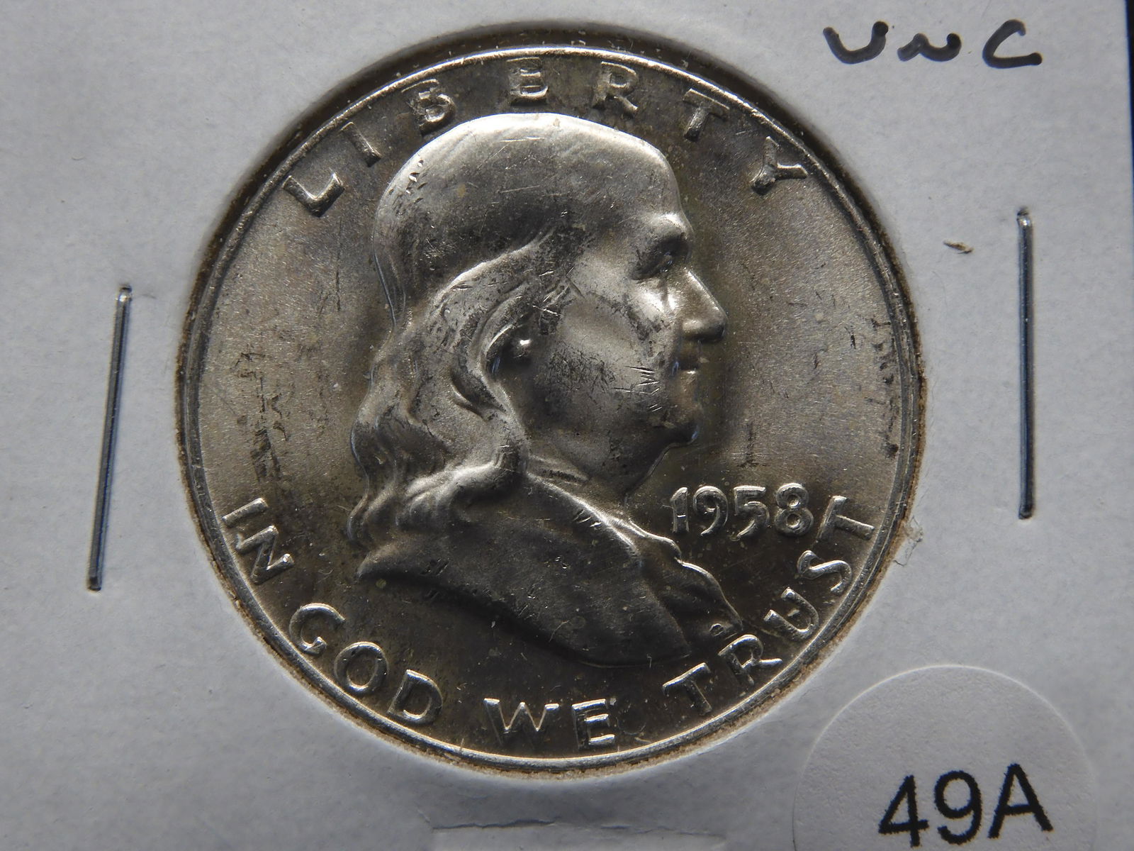 1958-D Franklin Half Dollar.  UNC. (1 of 3)